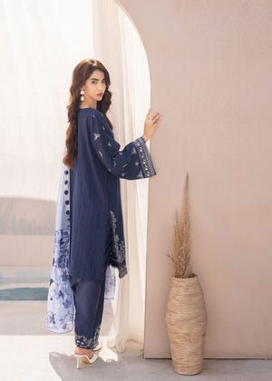 Women's dark blue embroidered tunic and pants with sheer light blue floral dupatta