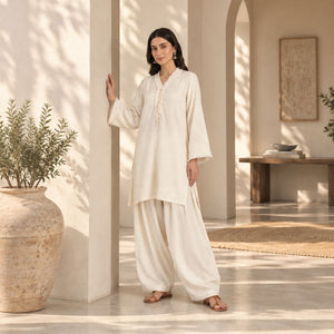 Women's off-white co-ord set: long tunic with tassel ties and wide-leg pants