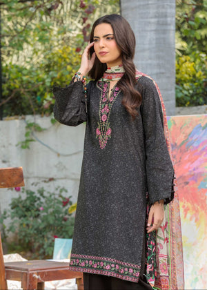 Women's 3-piece suit front: dark embroidered kurta with black pants and floral dupatta.
