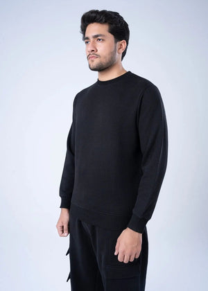 Black waffle-knit crewneck sweatshirt with ribbed cuffs and long sleeves