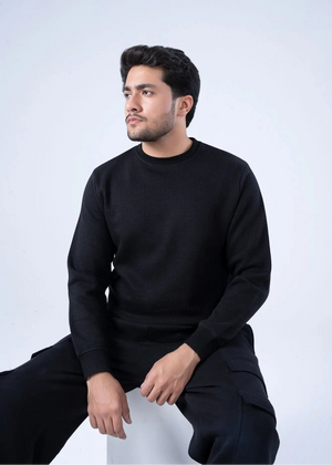 Black waffle-knit crewneck winter sweatshirt with long sleeves