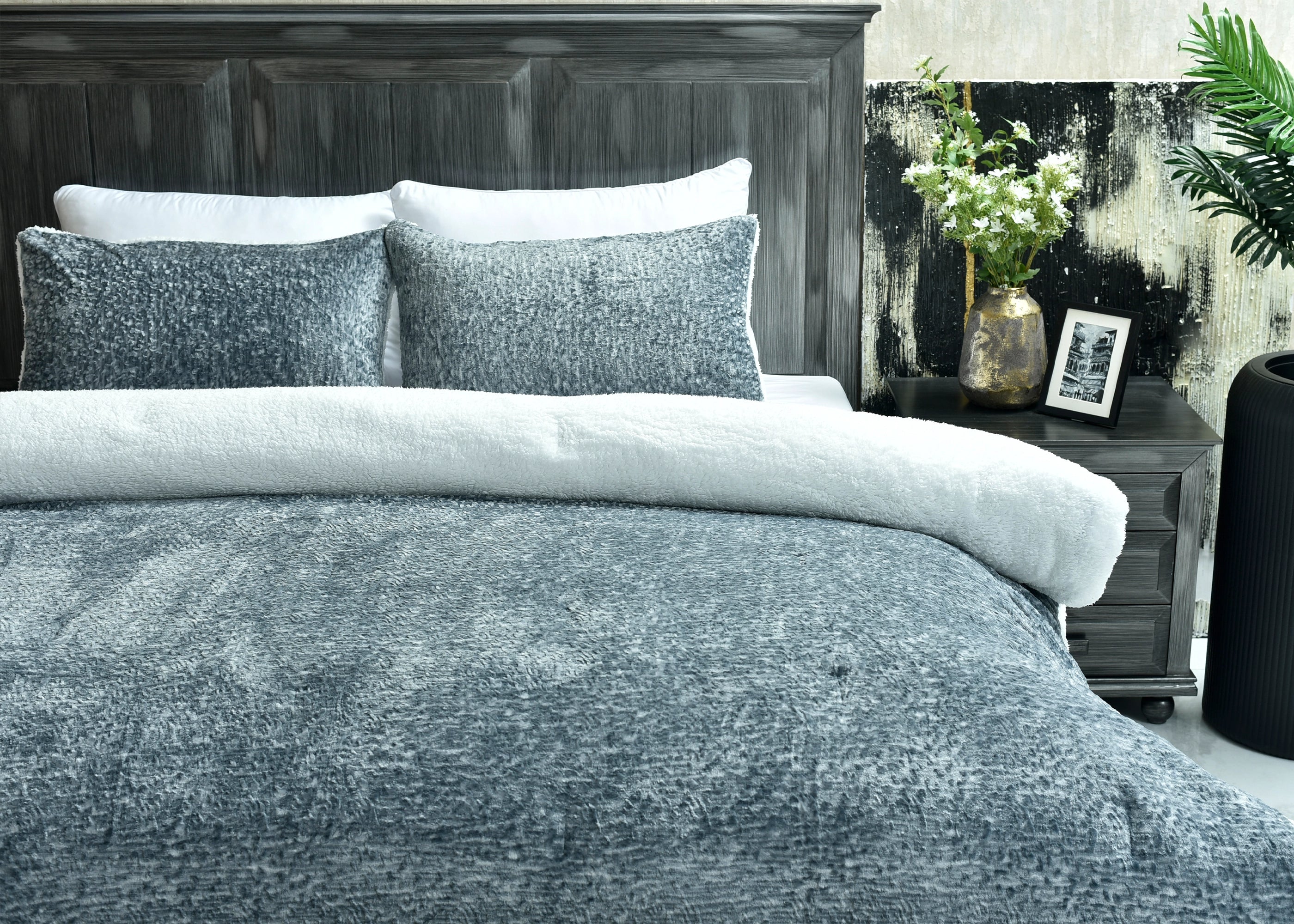Light grey flannel 3-piece bedding set on bed with two square pillow covers