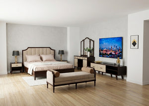 Bedroom furniture set with bed, ottoman bench, and dark media console with framed art