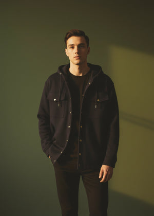 Black pullover hoodie with hood, drawstrings, and front pockets