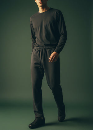 Men's black waffle-knit winter trousers, relaxed fit with elastic cuffs and pockets