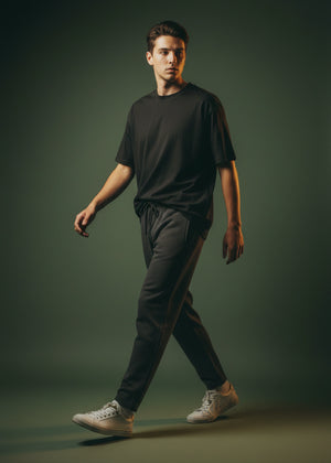 Men's black waffle-knit winter trousers with drawstring and tapered leg