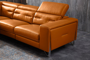 Orange leather sectional sofa with chaise, tufted back cushions, and metal legs