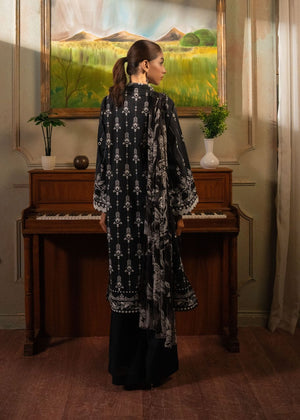 Dark printed 3-piece suit with long tunic and wide-leg pants, back view shows full pattern
