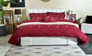 Red floral bedding set with comforter and matching pillowcases