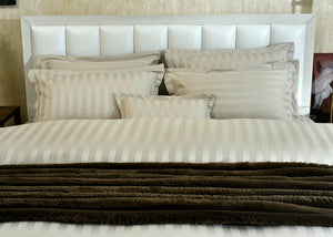 7-piece duvet cover set with light striped duvet and five coordinating pillow shams