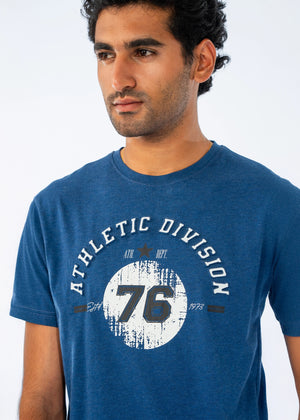 Men's blue crew-neck T-shirt close-up of Athletic Division 76 graphic