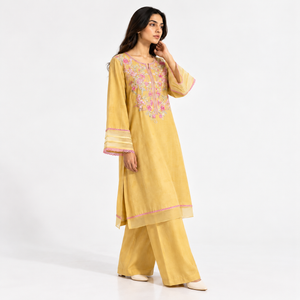 Mustard 2-piece suit with floral yoke embroidery, flared sleeves, and wide-leg trousers