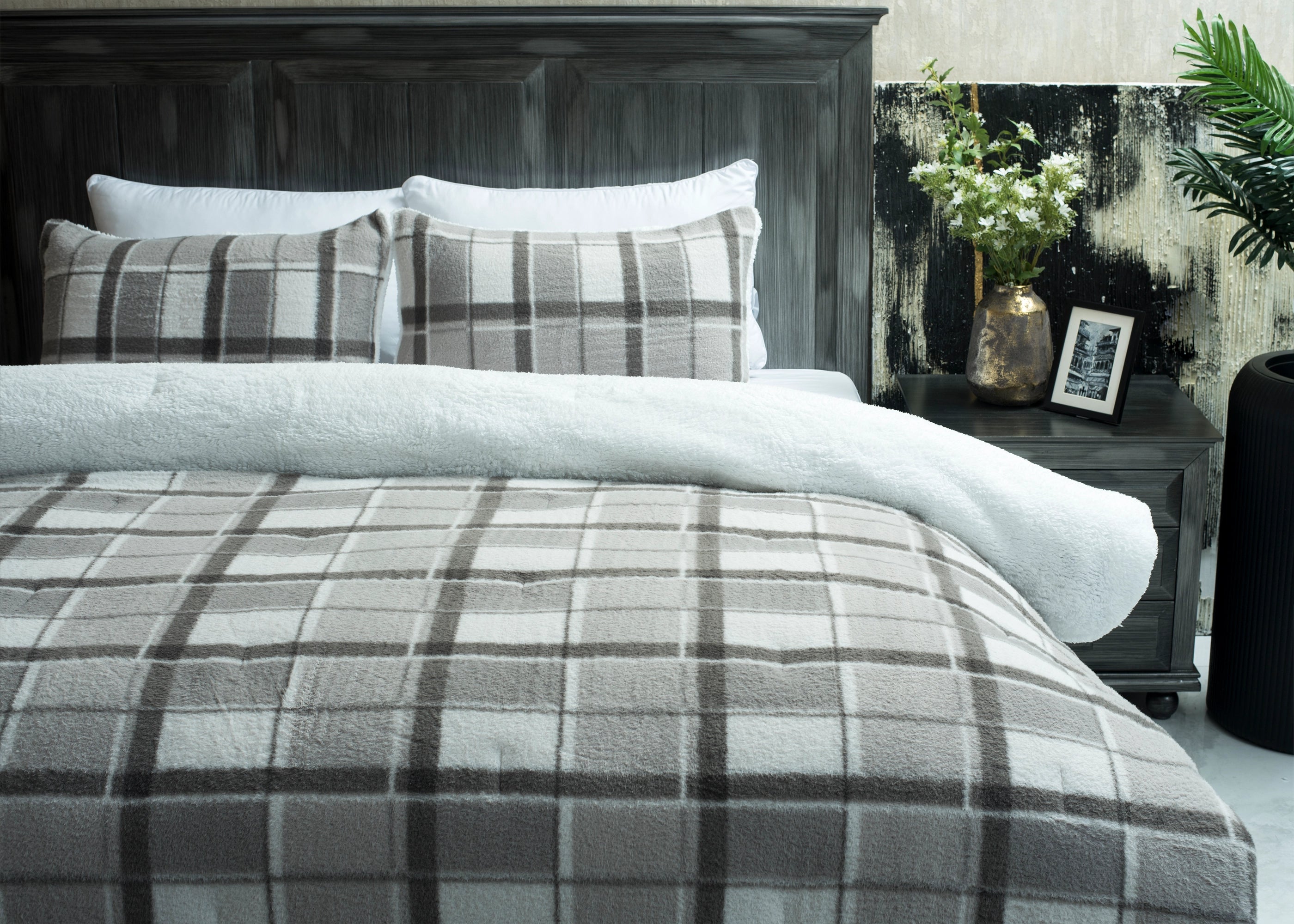 Grey plaid bedding set with plush comforter and white-edged pillow shams