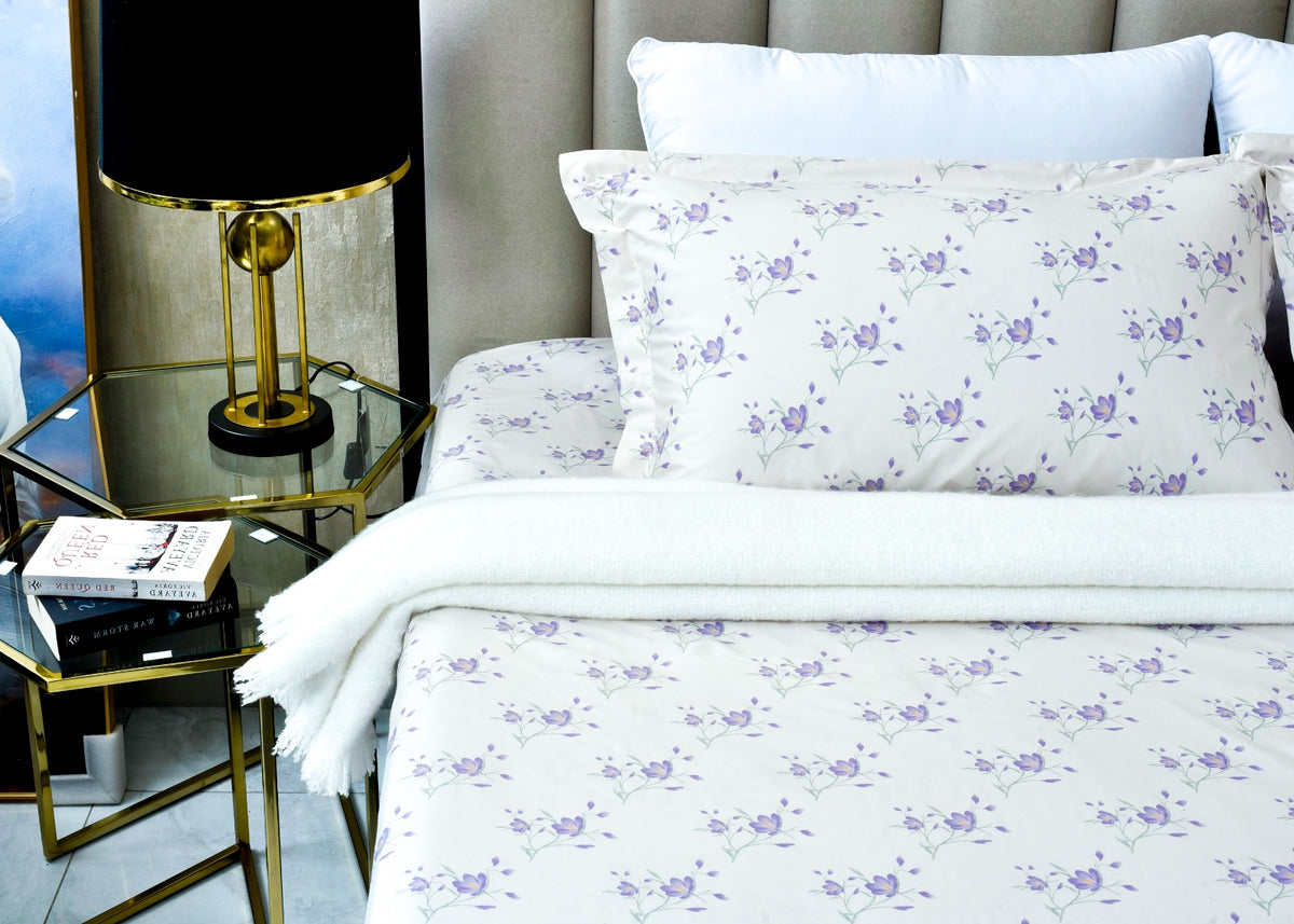 Ivory cotton sateen bed sheet with purple floral vine pattern and matching pillowcase