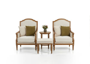 Sable upholstered armchairs with curved backs, green accent pillows, and small round side table