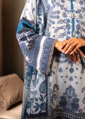Women's 3-piece printed suit close-up: blue-trimmed long tunic with floral paisley print