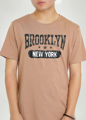Men's brown round-neck T-shirt close-up of BROOKLYN NEW YORK graphic