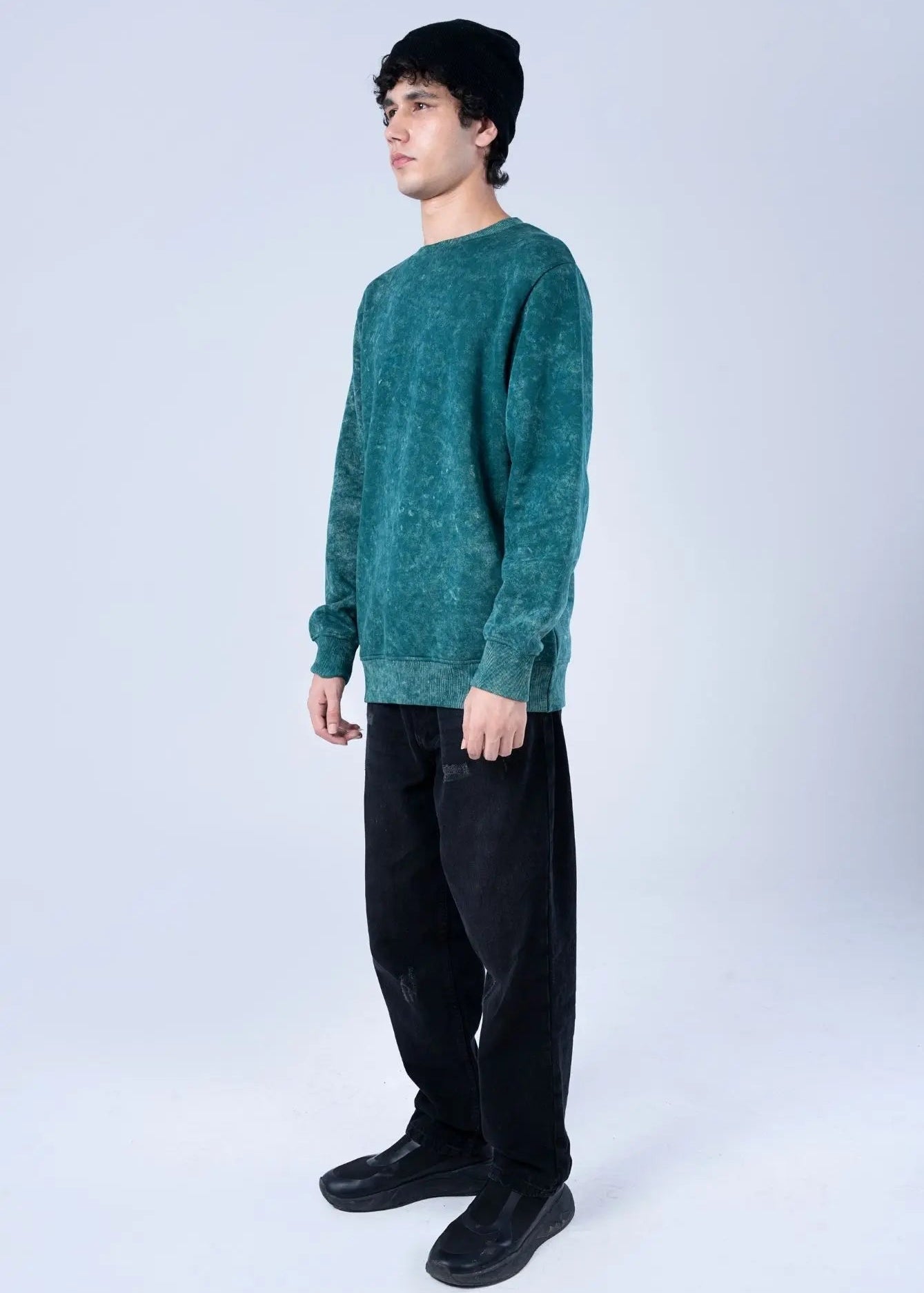 Men’s teal terry crewneck sweatshirt with long sleeves and ribbed cuffs