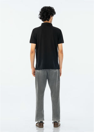 Men's black cotton pique polo shirt, back view, short sleeves and collar