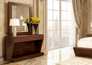 Dark brown wooden dresser with mirror and two lamps