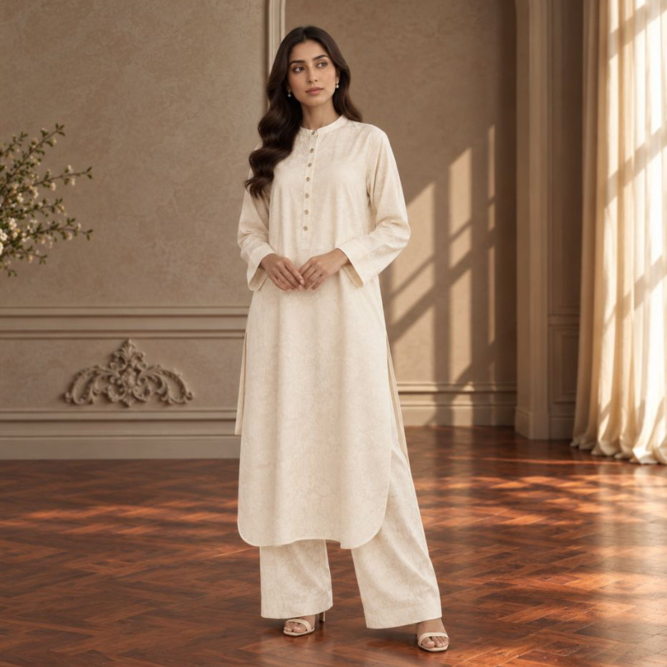 Cream women's two-piece suit: long button-front tunic with matching straight pants