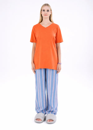 Women’s winter night suit with orange V-neck short-sleeve top and blue striped pants