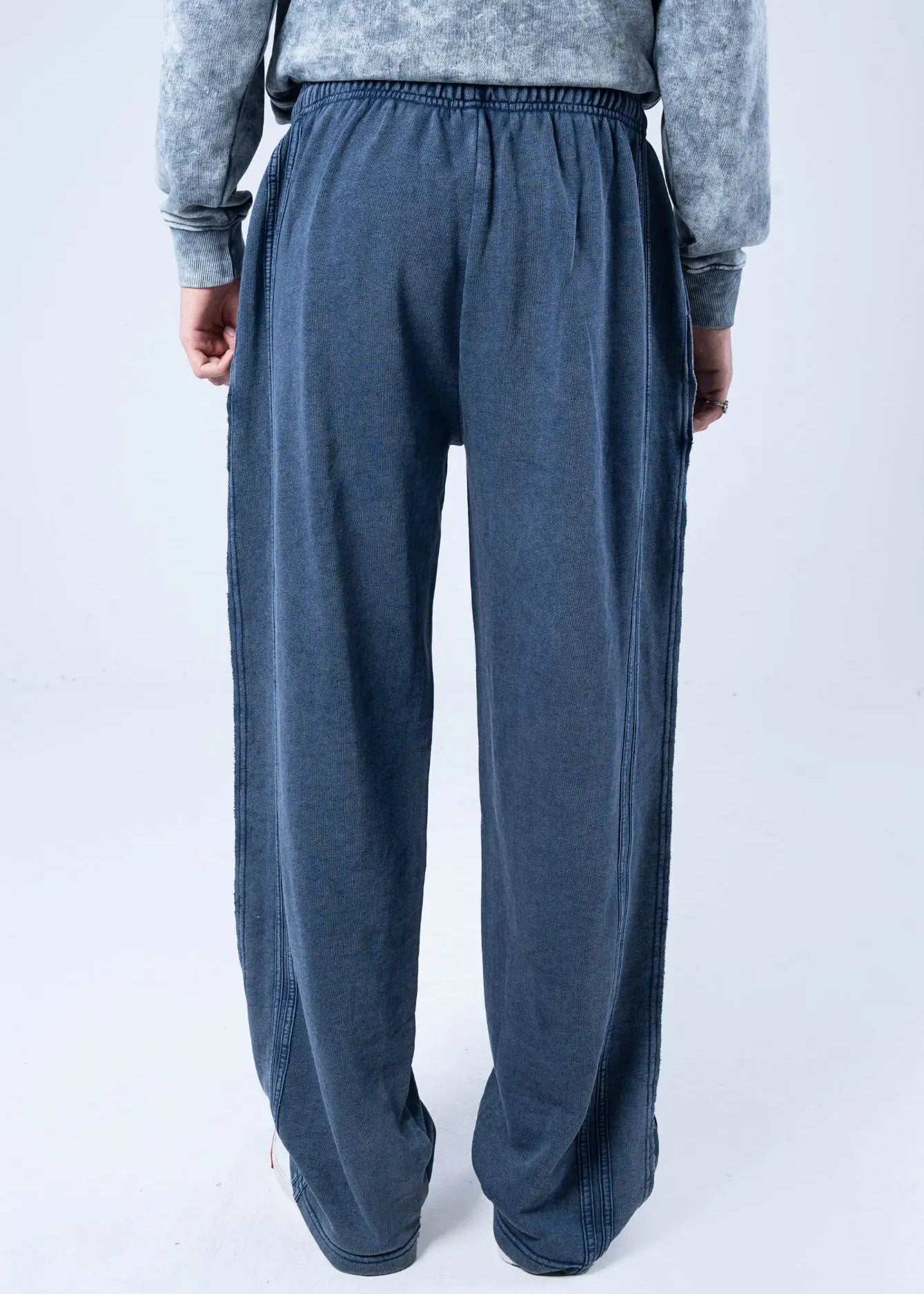 Men's navy terry pull-on trousers with elastic waistband and wide relaxed legs