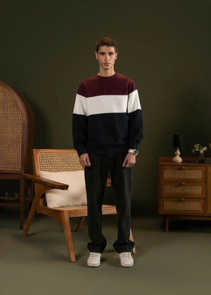 Men's crewneck striped fleece sweatshirt with maroon top, white middle band, navy bottom.