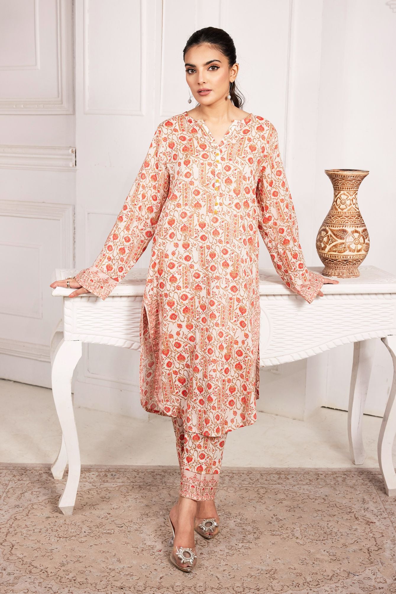Orange print tunic and pants set, long sleeves, round neckline, slim trousers