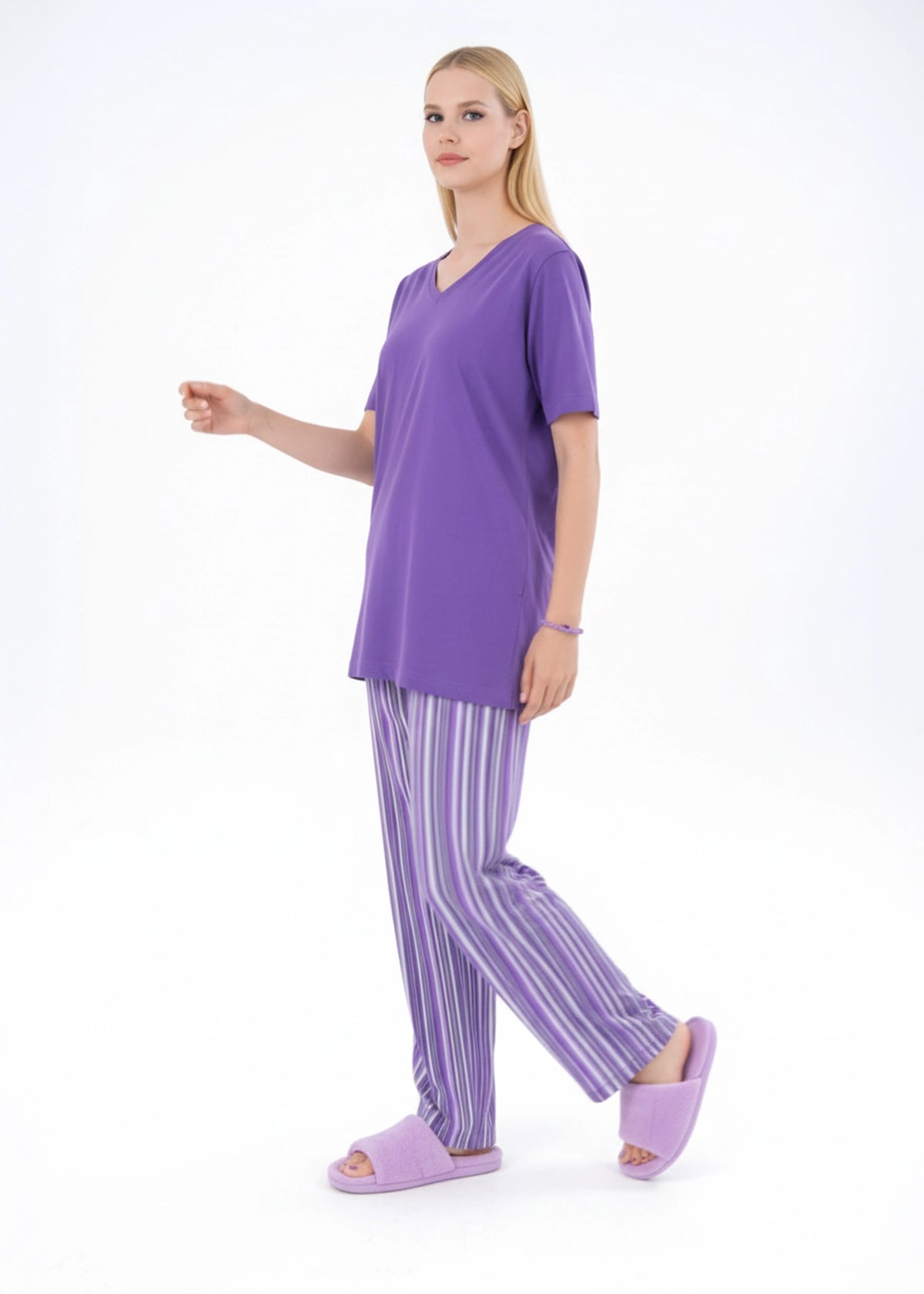 Women's winter night suit, side view: V-neck tunic and striped wide-leg trousers