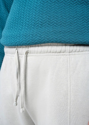 Men's stone terry pull-on trousers with elastic waistband and drawstring