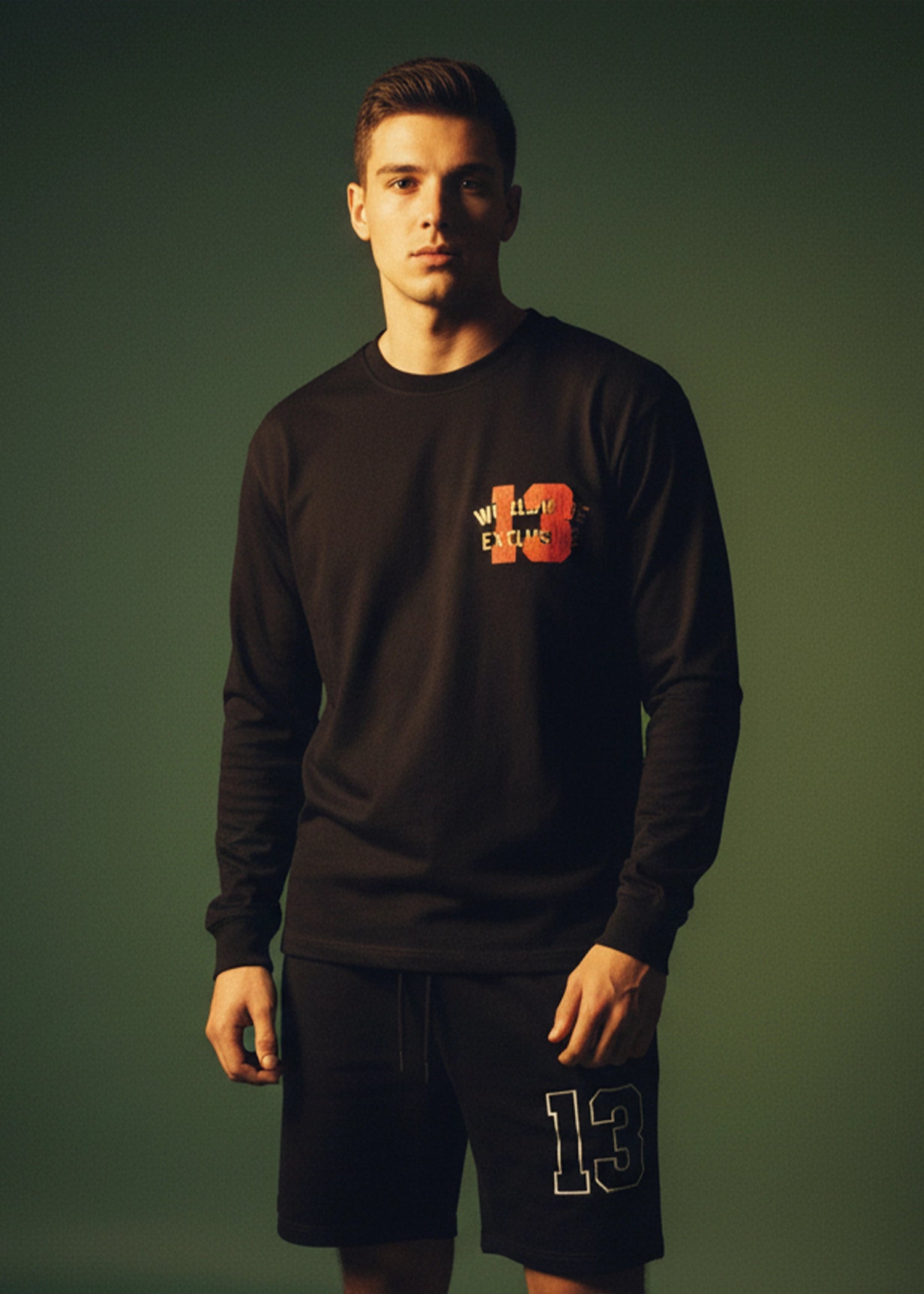 Men's long-sleeve crewneck T-shirt in charcoal black with chest graphic logo