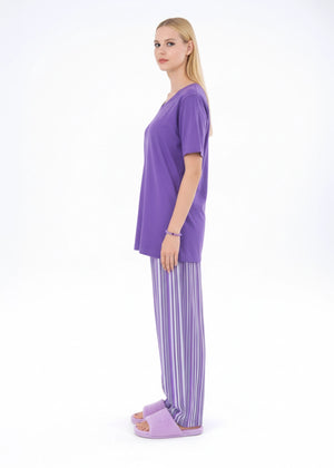 Women's winter night suit, profile view: V-neck tunic with striped wide-leg trousers