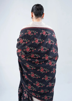 Black wool winter shawl with red floral pattern and cream-edged back trim