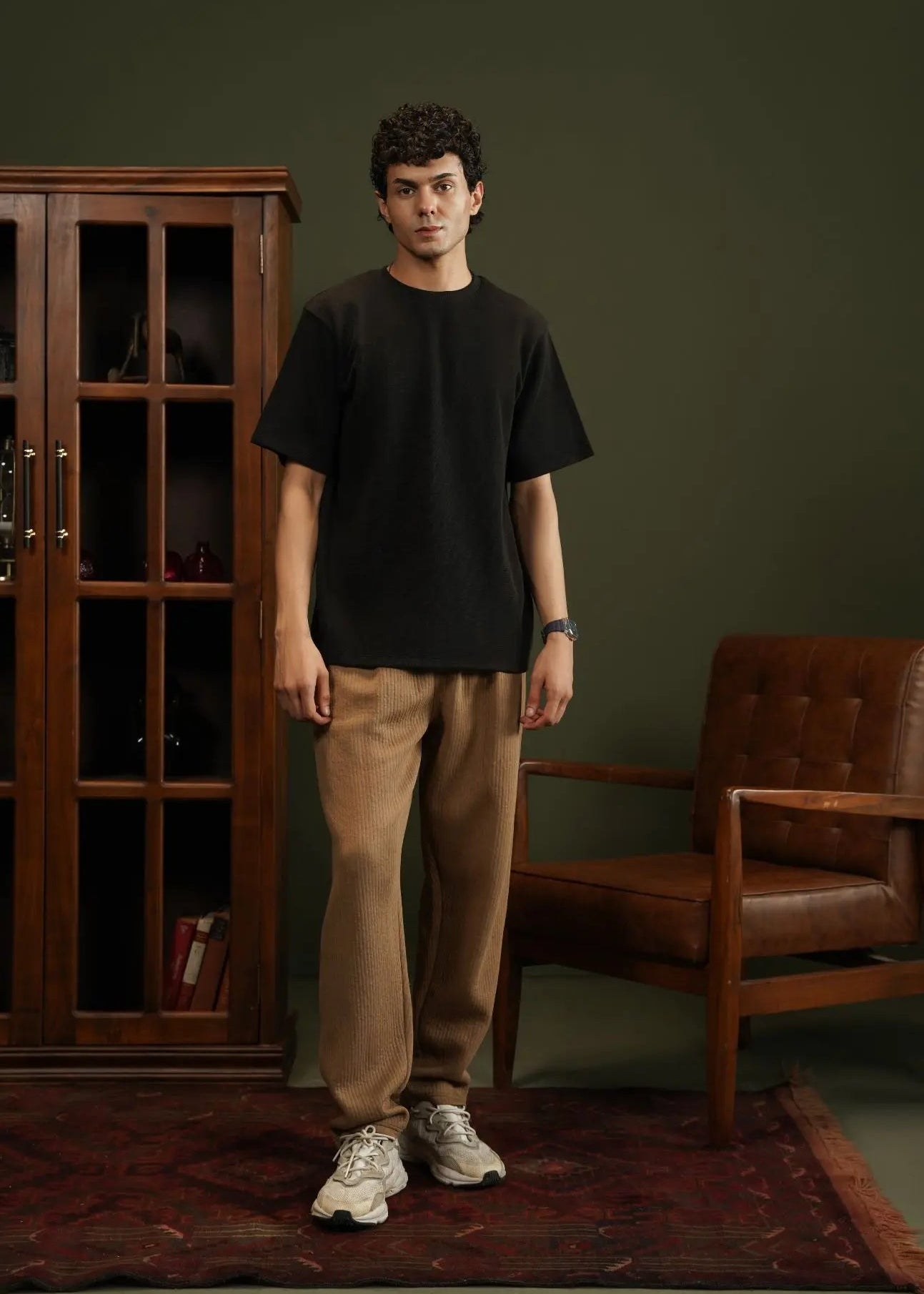 Men's black waffle-knit T-shirt, front view, crew neck with short sleeves