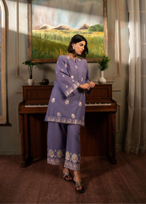 Women's purple embroidered tunic and pants set, front view with floral motifs