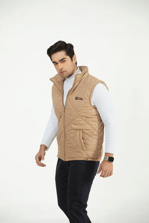 Men's camel sleeveless puffer vest with quilted diamond panels, zip front