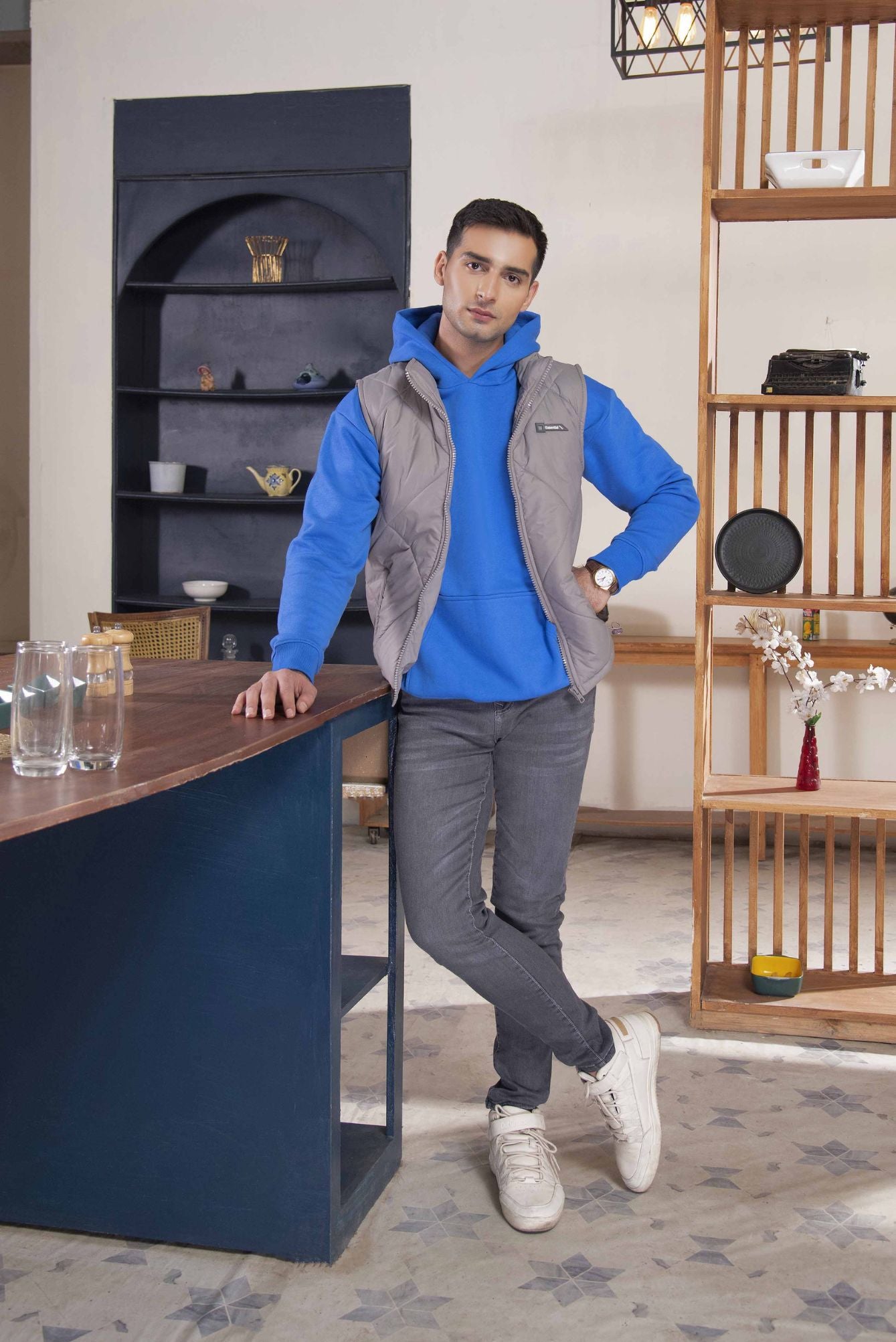 Men's hooded colorblock puffer jacket, blue sleeves, gray front panel, zip closure