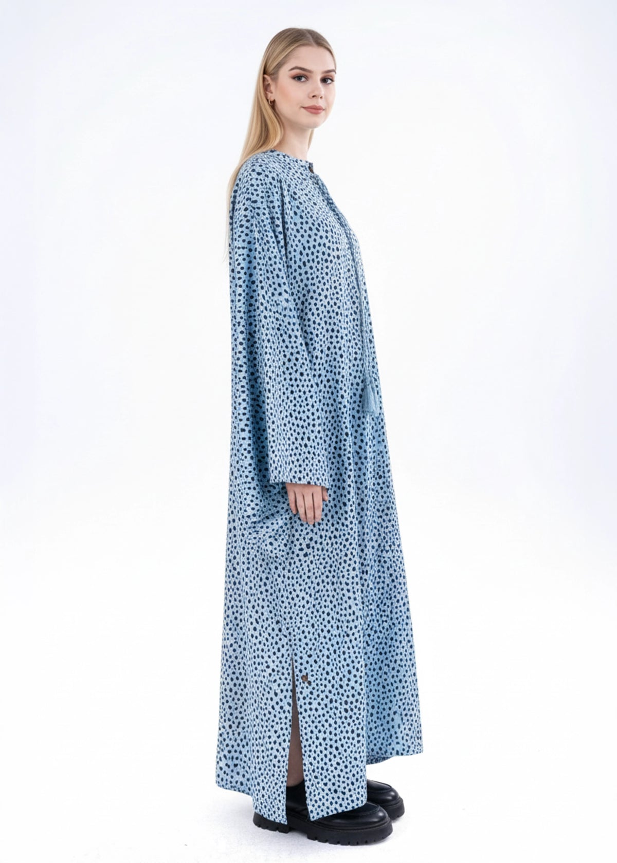 Women's aqua printed long kurta with keyhole neckline and side slit, profile view