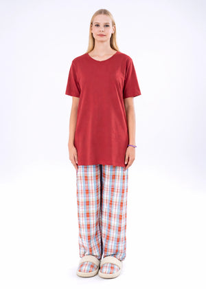 Women's winter night suit with maroon short-sleeve top and red plaid pajama pants, front