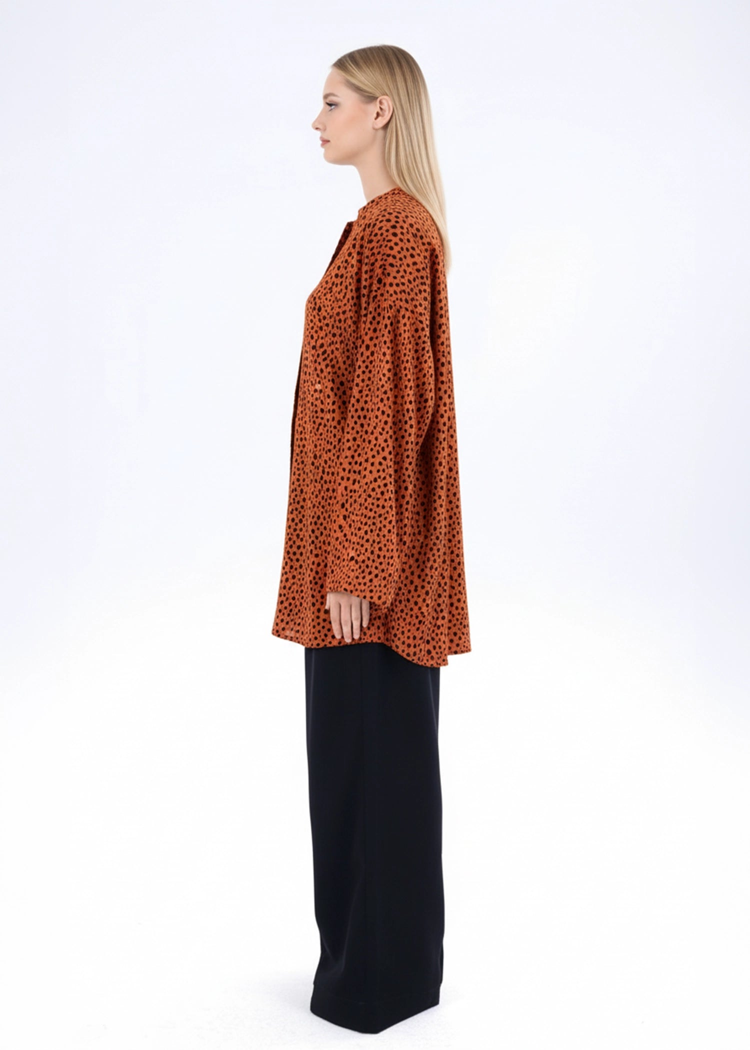 Rust printed long-sleeve western top with high neck and loose A-line silhouette