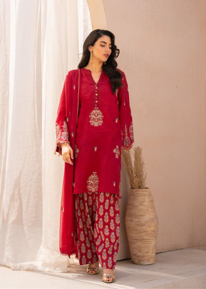 Women's maroon embroidered kurta and patterned pants with long sheer dupatta