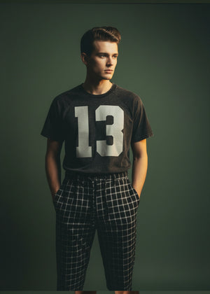 Black crewneck t-shirt with large white '13' graphic, front view