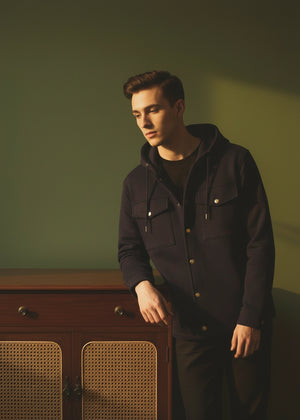 Black hooded pullover hoodie with snap front, flap pockets, and pouch pocket