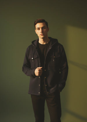 Black hooded pullover hoodie with drawstring and snap placket, front pockets