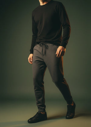 Men's black waffle-knit winter trousers with drawstring waist, side pockets