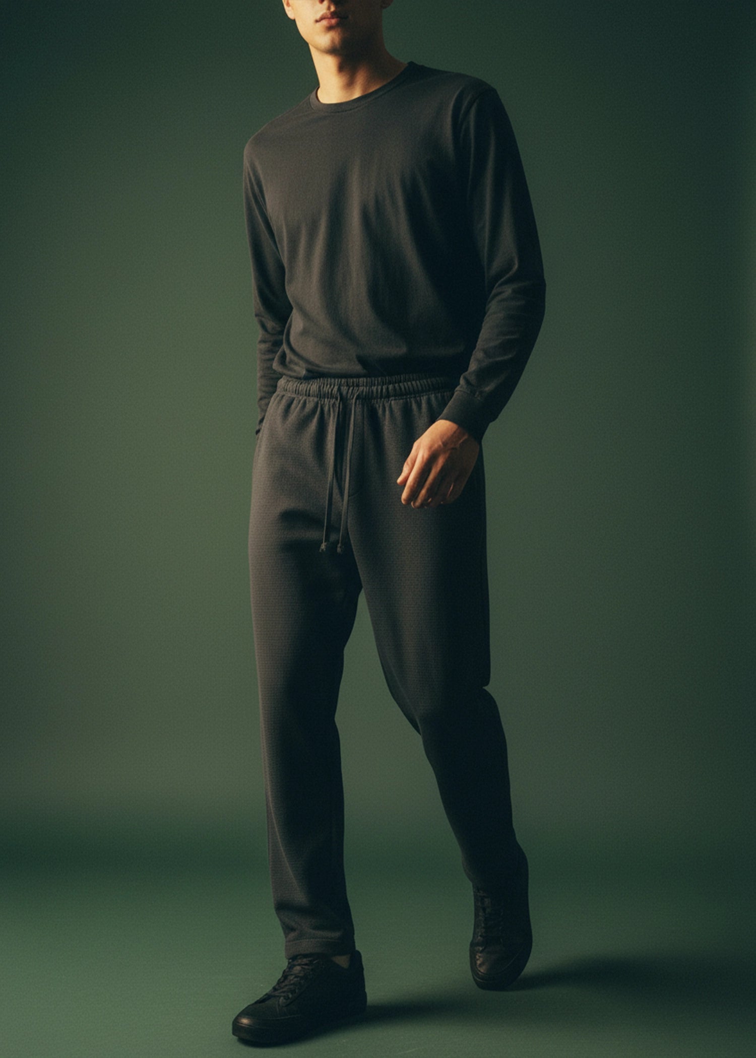 Men's black waffle-knit winter trousers, relaxed fit with elastic cuffs and pockets