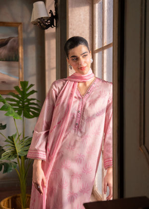 Women's pink kurta with V-neck embroidery detail and decorative trim at cuffs