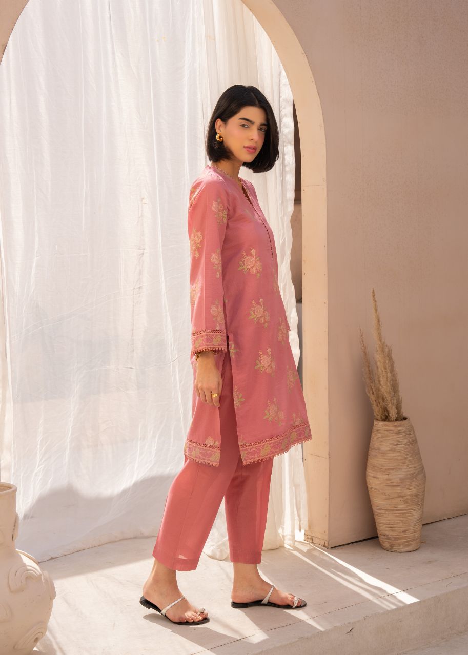 Pink floral 2-piece suit with long kurta and matching pants, full-length front view