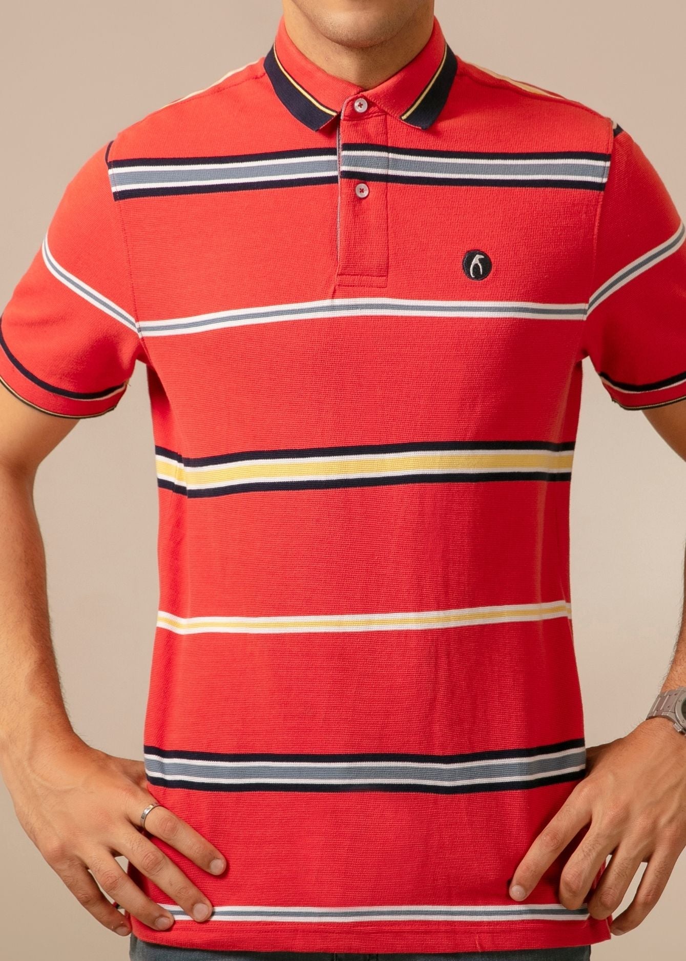 Men's orange-red polo shirt with white and dark striped bands, button placket, short sleeves